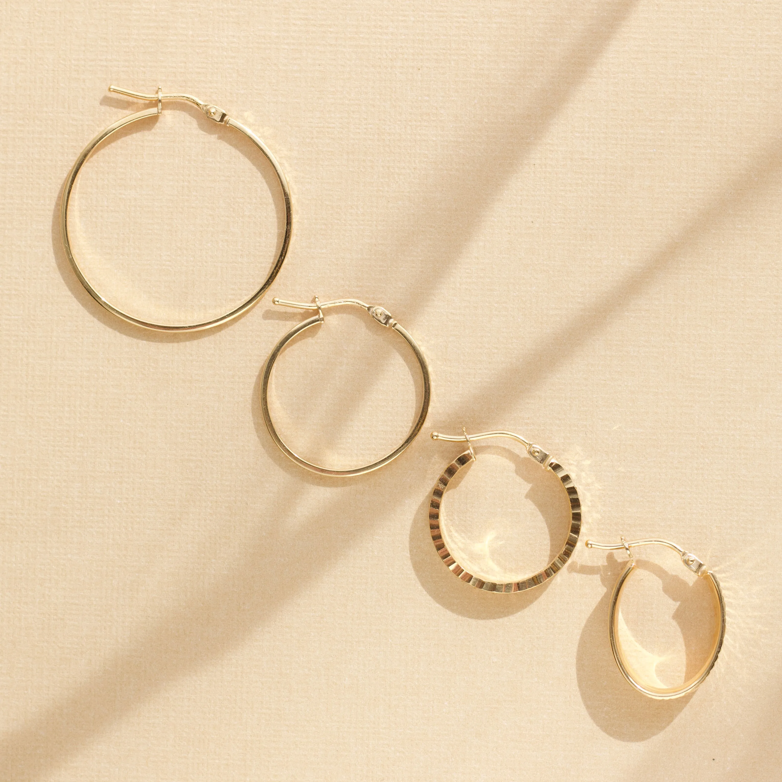 Diamond Cut Oval Hoop Earrings
