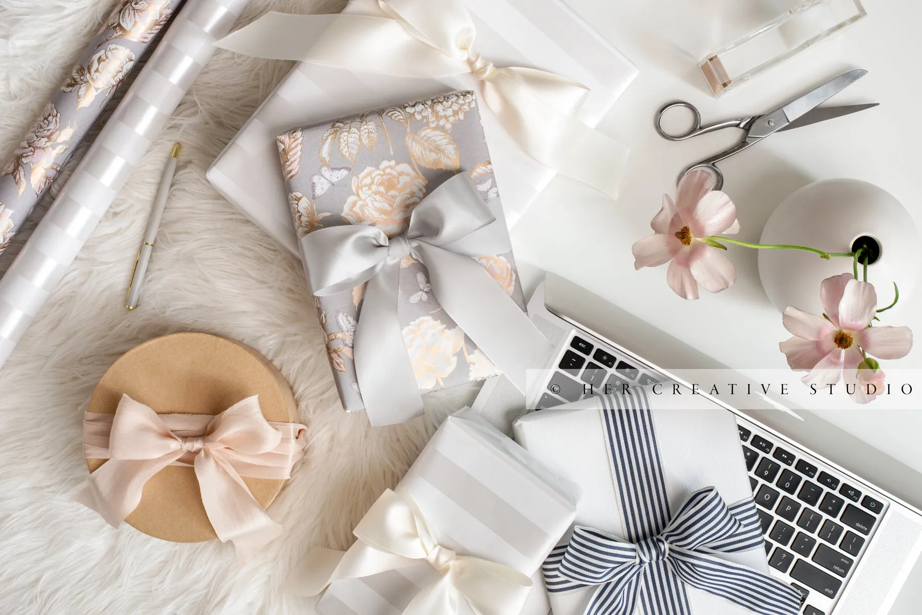 Gifts, Laptop & Pretty Wrapping Paper. Stock Image
