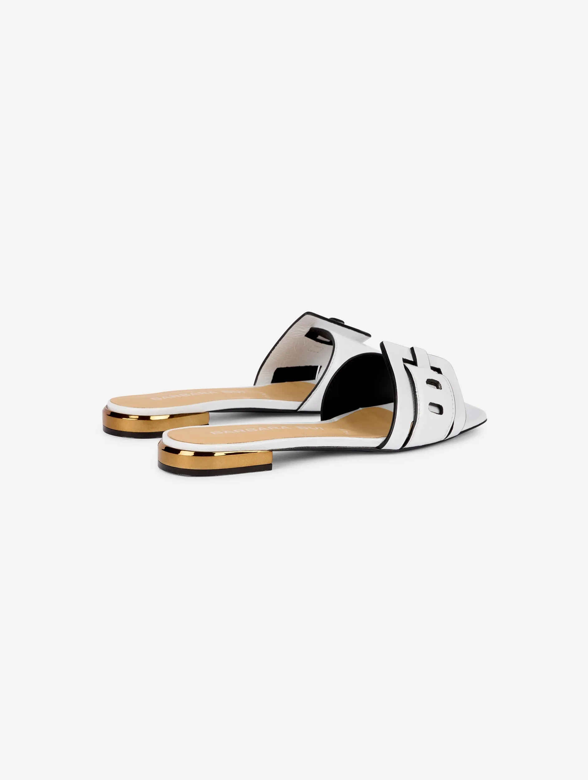 Mules in white patent leather