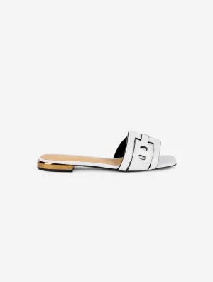 Mules in white patent leather