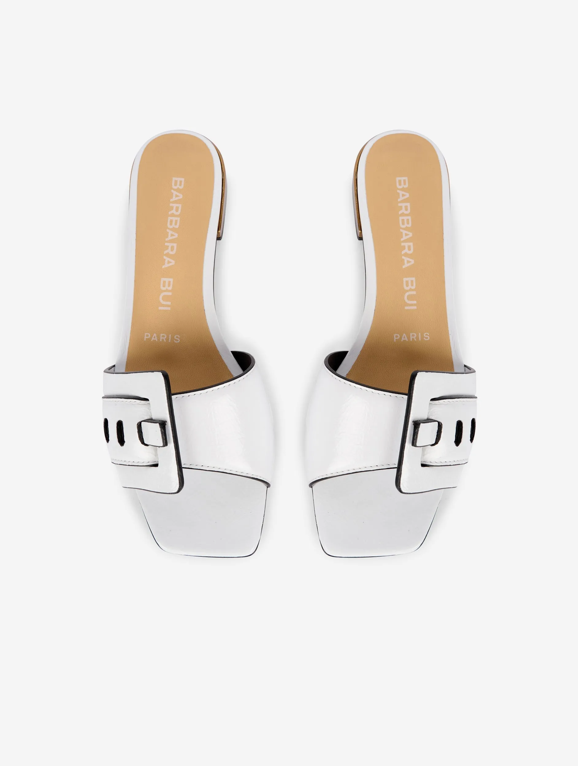 Mules in white patent leather