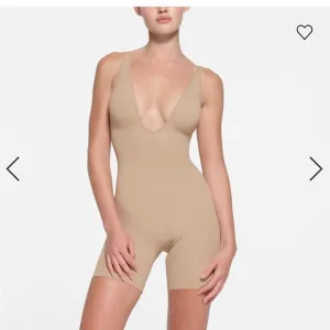 SKIMS Plunge Shapewear Bodysuit with adjustable straps